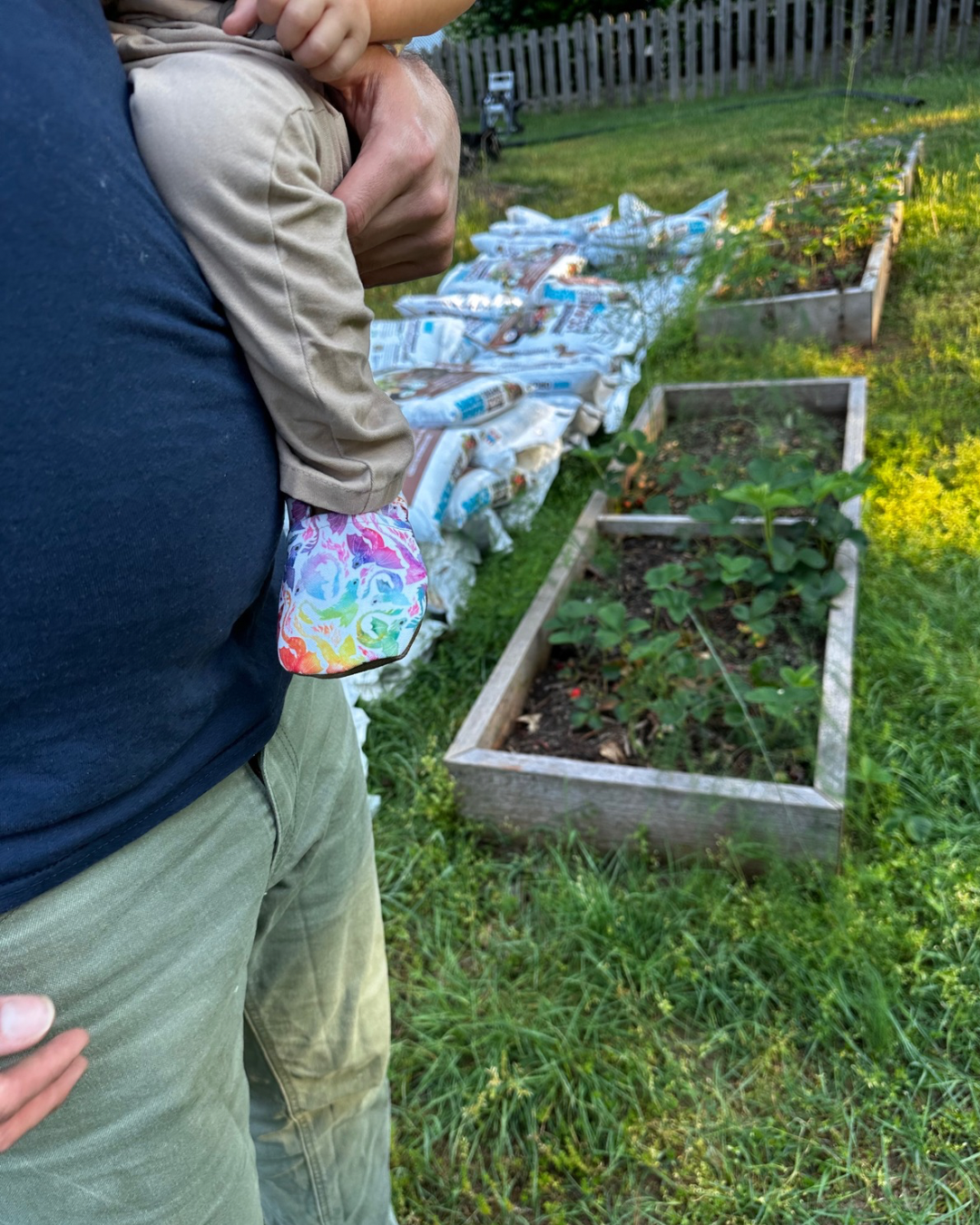 Lifestyle photo: Limited edition Rainbow Dragons eco-canvas Cabooties baby shoes