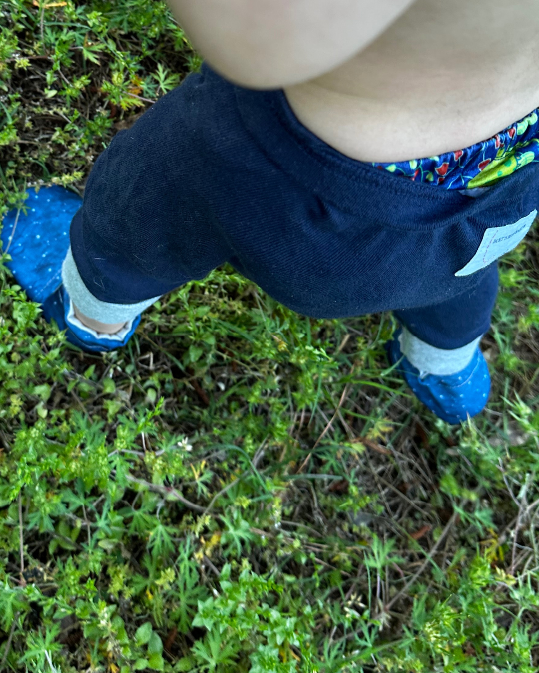 Lifestyle photo: Limited edition Summer Nights eco-canvas Cabooties baby shoes